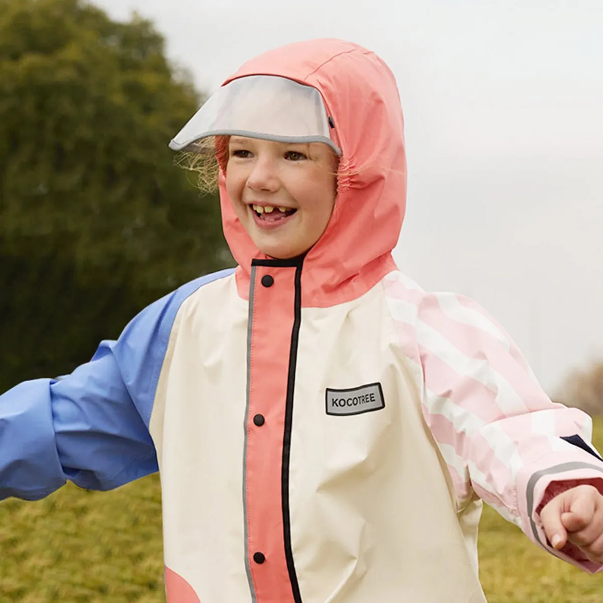 Bold Geometric Print Cream & Pink Raincoat for Kids
