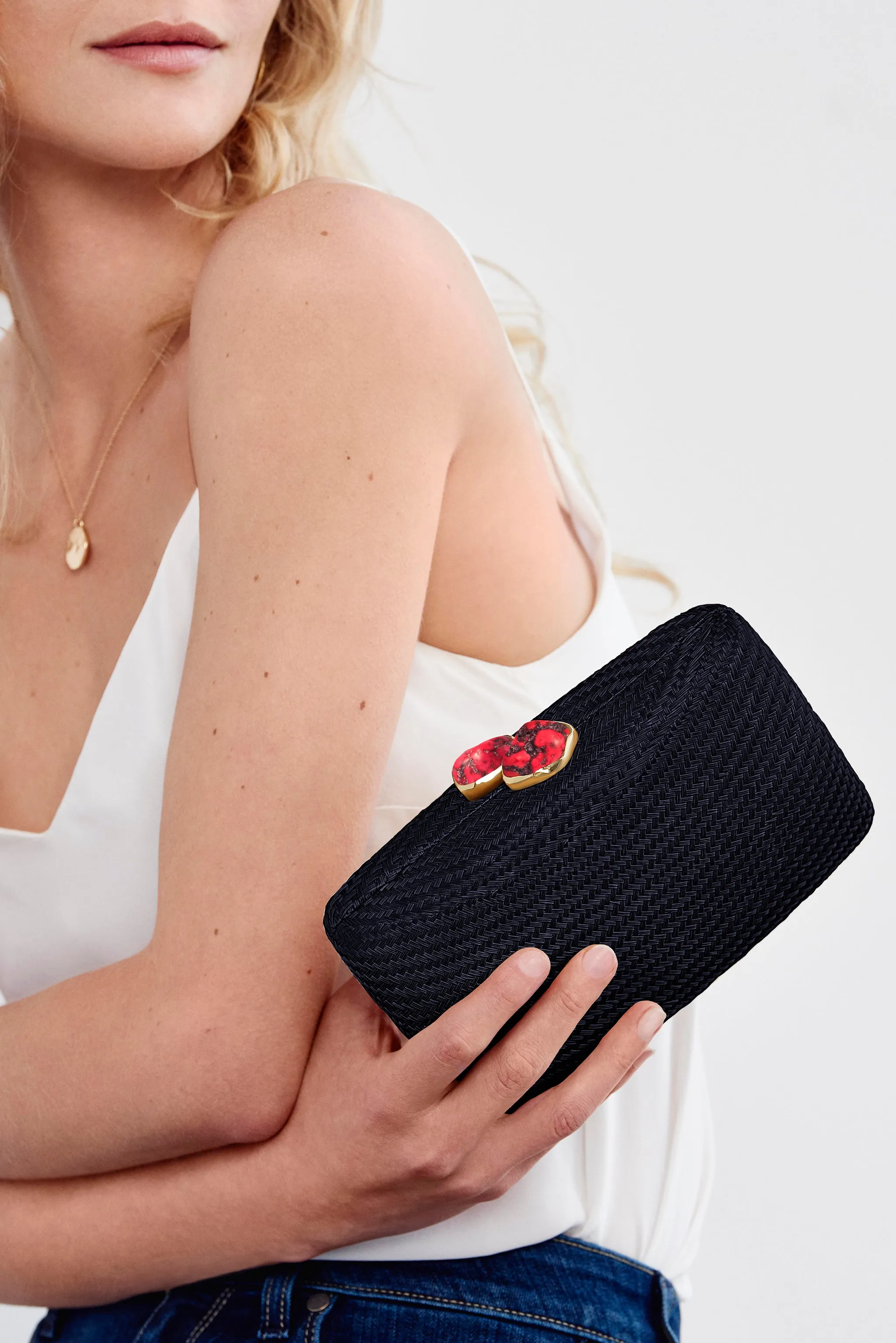 Jen clutch with red stone